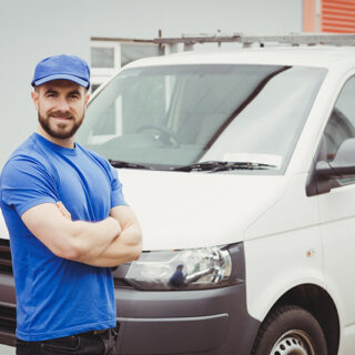 Man standing in front of van