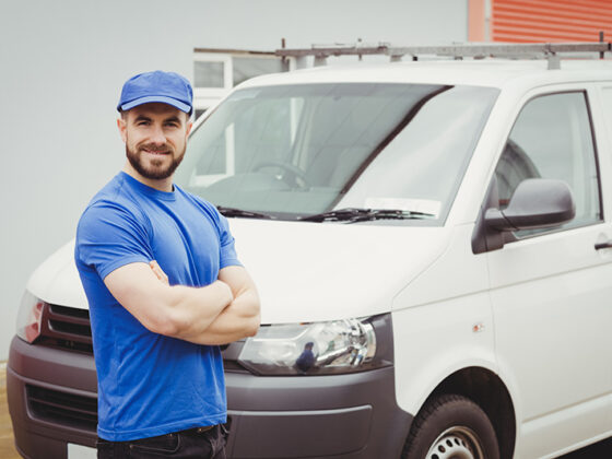 Man standing in front of van