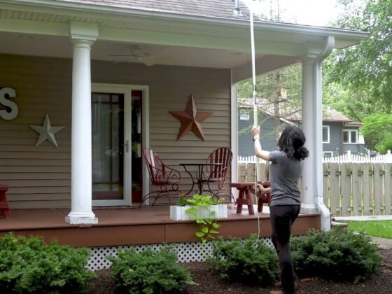 A person prepares for gutter cleaning